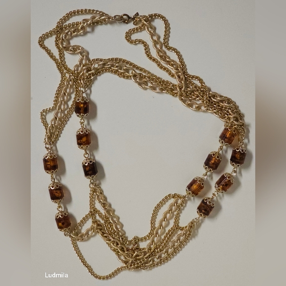 Sarah Coventry Jewelry - Sarah Coventry gold-toned triple chain with amber acrylic beads women's necklace